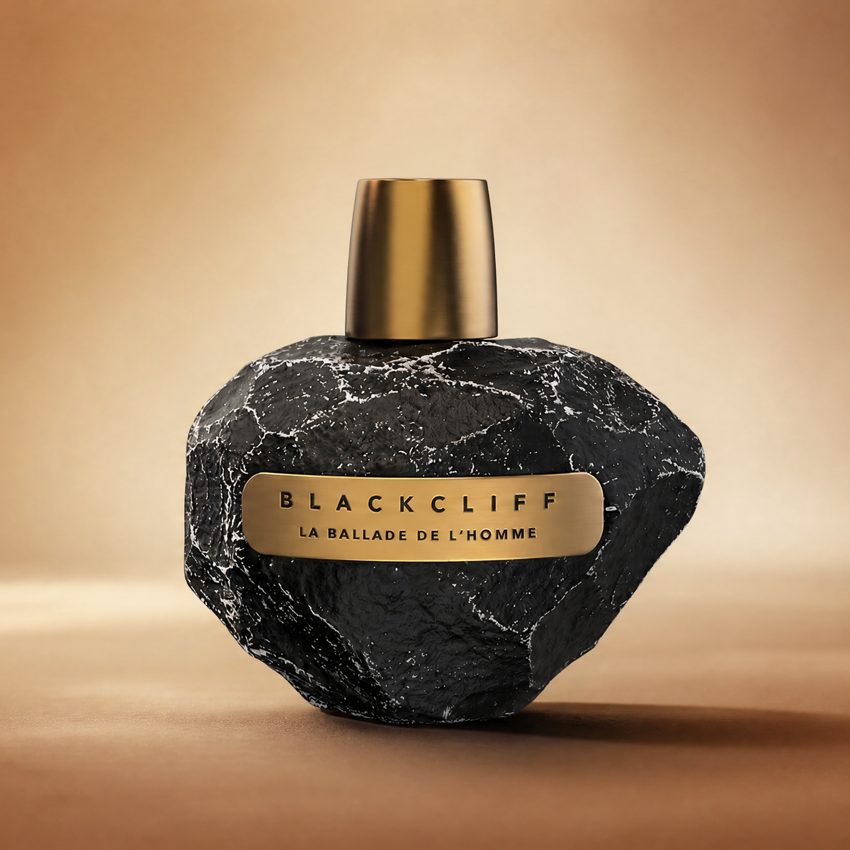 Black stone-textured perfume bottle with gold cap and BLACKCLIFF label